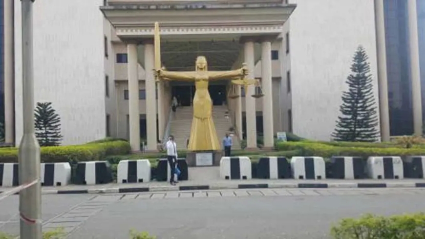 Court orders CBN to pay German ₦63.7m, $10,000 for illegal detention